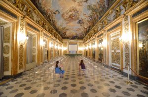 The girls contemplate the long hall of the Palazzo Medici